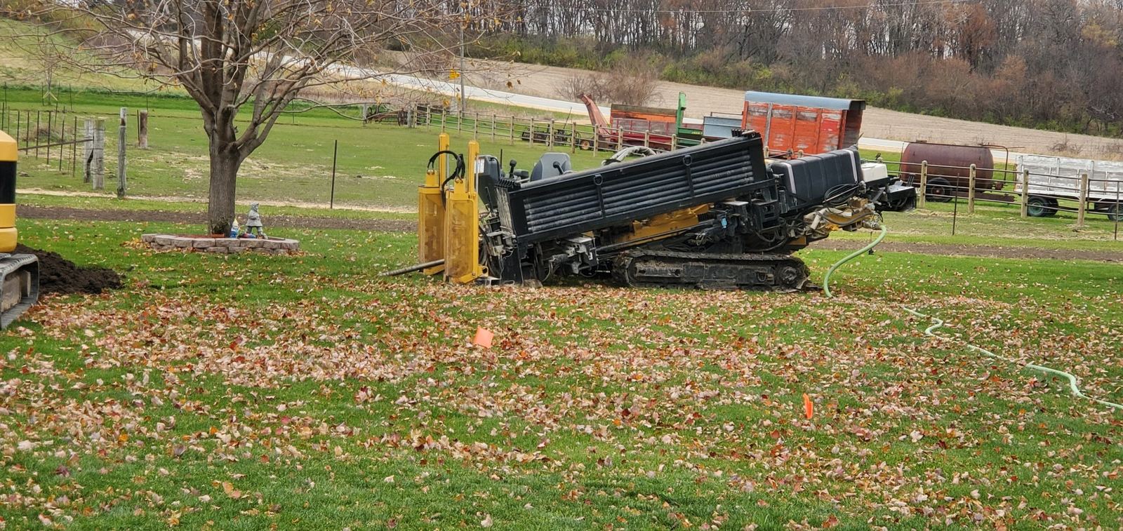 GudenkaufUnderground directional drilling rig boring under a rural Iowa yard